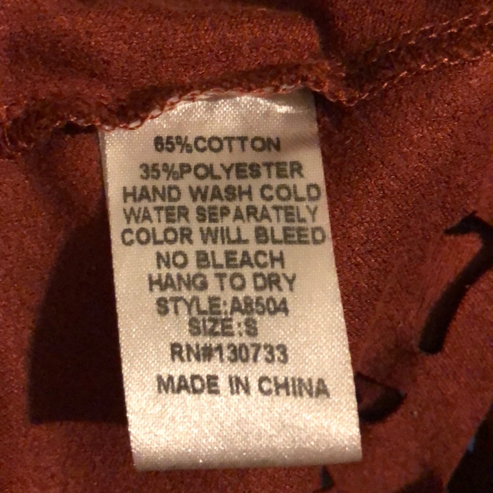Rust colored skirt with cutouts at bottom - Picture 3 of 3